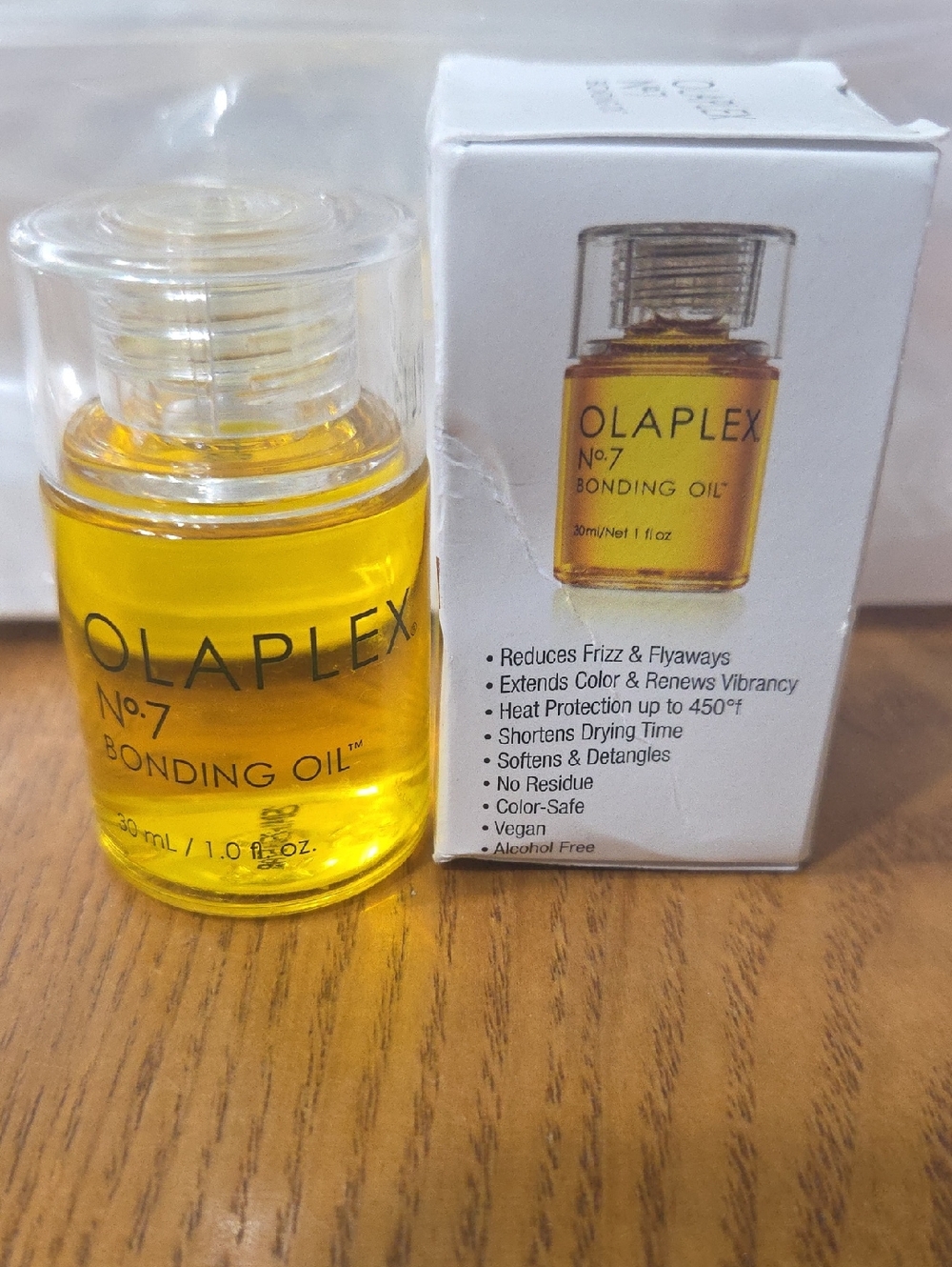 OLAPLEX No.7 Bonding Oil — Clear Bottle with Yellow Oil